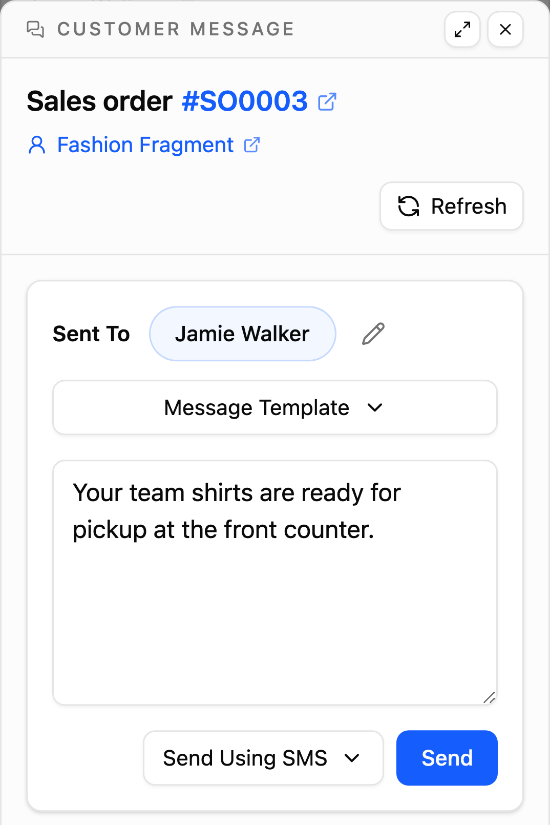 A customer message on sales order SO0003 to Jamie Walker: “Your team shirts are ready for pickup at the front counter.”, with Send Using SMS selected